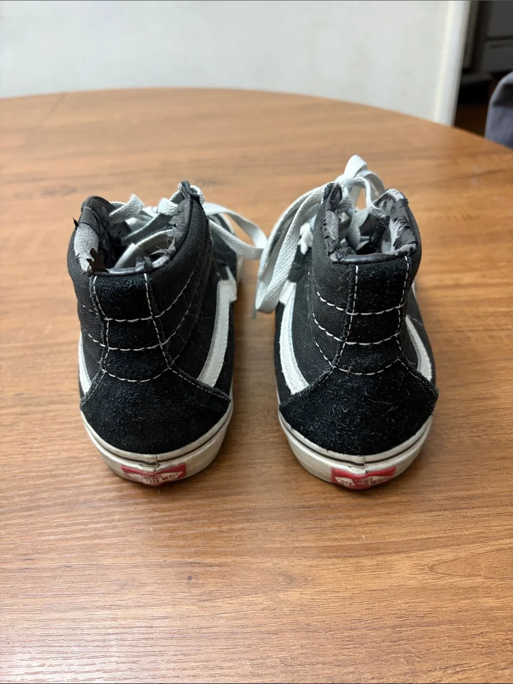 Vans Black and White High-Top Skate Sneakers